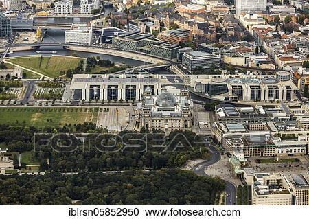 Stock Image - Brandenburg Gate at Pariser Platz, Reichstag and behind it Paul-Löbe-Haus and Marie-Elisabeth-Lüders-Haus, Berlin, Germany, Europe. Fotosearch
