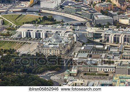 Brandenburg Gate, Reichstag and behind it the Paul Löbe House, Berlin, Germany, Europe View Large Photo Image Stock Photograph - Brandenburg Gate, Reichstag and behind it the Paul Löbe House, Berlin, Germany, Europe. Fotosearch