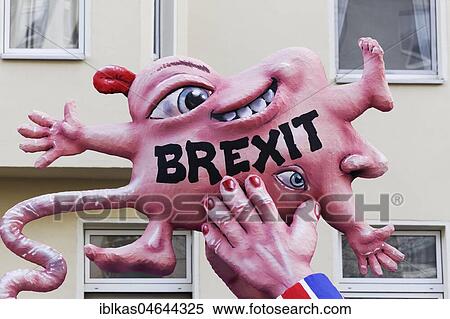 British Prime Minister Theresa May holds a deformed child, Brexit-Baby, political caricature to Brexit, motto caravan during Carnival Monday procession 2018, Düsseldorf, North Rhine-Westphalia, Germany, Europe View Large Photo Image Stock Photography - British Prime Minister Theresa May holds a deformed child, Brexit-Baby, political caricature to Brexit, motto caravan during Carnival Monday procession 2018, Düsseldorf, North Rhine-Westphalia, Germany, Europe. Fotosearch