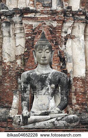 Buddha statue in Wat Maha Tat, Wat Mahathat, Ayutthaya, Phra Nakhon Si Ayutthaya, Thailand, Asia View Large Photo Image Stock Photo - Buddha statue in Wat Maha Tat, Wat Mahathat, Ayutthaya, Phra Nakhon Si Ayutthaya, Thailand, Asia. Fotosearch