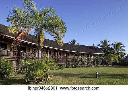 Stock Image - Building with apartments, Palms, Garden, Luxury hotel, Interconti Resort, Moorea, Society Islands, Islands under the Wind, Pacific Ocean, French Polynesia, Oceania. Fotosearch