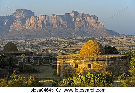 Bungalow of the Gheralta Lodge in front of the Gheralta Mountain Massif, Hawzen, Tigray Region, Ethiopia, Africa View Large Photo Image Stock Photo - Bungalow of the Gheralta Lodge in front of the Gheralta Mountain Massif, Hawzen, Tigray Region, Ethiopia, Africa. Fotosearch