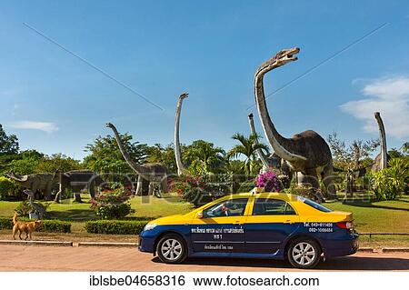 Cab in front of Dinosaur Park, Jurassic Park, Non Buri, Sahatsakhan district, Kalasin province, Isan, Northeast Thailand View Large Photo Image Stock Photograph - Cab in front of Dinosaur Park, Jurassic Park, Non Buri, Sahatsakhan district, Kalasin province, Isan, Northeast Thailand. Fotosearch
