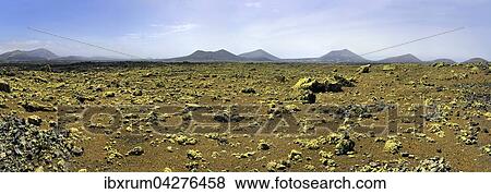 Stock Photo - Caldera Colorada, mit Moos bewachsene Brocken Lava in Vulkanbergen, Mancha Blanca, Lanzarote, Kanarische Insel, Spanien, Europa. Fotosearch