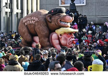 Carnival parade with theme cars by wagon builder Jaques Tilly, Russia Affair, Donald Trump, Düsseldorf, North Rhine-Westphalia, Germany, Europe View Large Photo Image Stock Image - Carnival parade with theme cars by wagon builder Jaques Tilly, Russia Affair, Donald Trump, Düsseldorf, North Rhine-Westphalia, Germany, Europe. Fotosearch