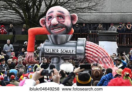 Carnival parade with theme cars by wagon builder Jaques Tilly, SPD, Martin Schulz, Selber Schulz, Düsseldorf, North Rhine-Westphalia, Germany, Europe View Large Photo Image Stock Photo - Carnival parade with theme cars by wagon builder Jaques Tilly, SPD, Martin Schulz, Selber Schulz, Düsseldorf, North Rhine-Westphalia, Germany, Europe. Fotosearch
