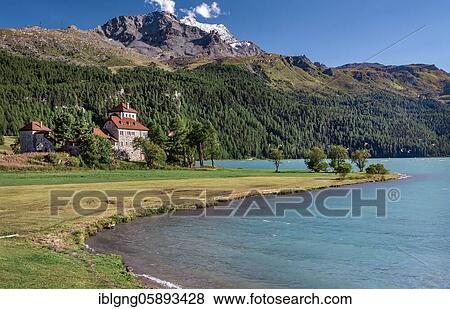 Stock Photo - Castle Crap da Saß am Seeufer, Silvaplana, Inn Valley, Bernina Alps, Upper Engadine, Engadine, Grisons, Switzerland, Europe. Fotosearch