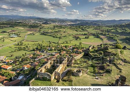 Stock Photography - Castle of Polignac above the village, Polignac near Le Puy en Velay, Haute-Loire department, Auvergne-Rhone-Alpes, France, Europe. Fotosearch