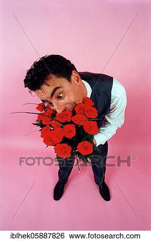 Stock Photograph - Cavalier with roses, flirt, in love, Berlin, Germany, Europe. Fotosearch