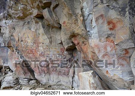 Stock Image - Cave paintings in the Cave of Hands, Cueva de las Manos, UNESCO World Heritage Site, Santa Cruz Province, Argentina, South America. Fotosearch