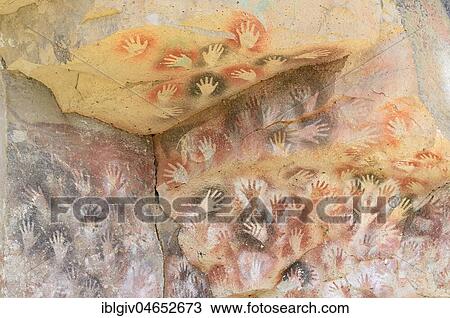 Stock Image - Cave paintings in the Cave of Hands, Cueva de las Manos, UNESCO World Heritage Site, Santa Cruz Province, Argentina, South America. Fotosearch