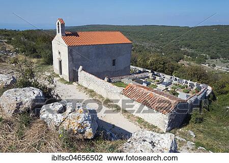 Stock Image - Cemetery chapel Kapela Sv Stjepana no grobljua, Lubenice, Cres Island, Kvarner Gulf Bay, Croatia, Europe. Fotosearch