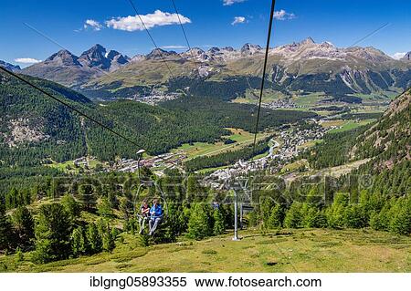 Stock Photography - Chairlift to Alp Languard with village overview, Pontresina, Bernina Alps, Upper Engadine, Engadine, Grisons, Switzerland, Europe. Fotosearch