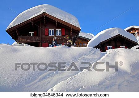 Picture - Chalets with deep snow in the village, Bettmeralp, Aletsch area, Upper Valais, Valais, Switzerland, Europe. Fotosearch