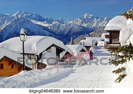 Stock Photography - Chalets with deep snow in the village, in the back Dom 4545m, Matterhorn 4478m and Weisshorn 4505m, Bettmeralp, Aletsch area, Upper Valais, Valais, Switzerland, Europe. Fotosearch