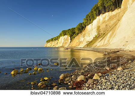 Chalk cliffs of the cliffs in the morning light, Baltic Sea, Jasmund National Park, Rügen Island, Mecklenburg-Western Pomerania, Germany, Europe View Large Photo Image Stock Photo - Chalk cliffs of the cliffs in the morning light, Baltic Sea, Jasmund National Park, Rügen Island, Mecklenburg-Western Pomerania, Germany, Europe. Fotosearch