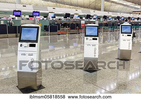 Check-in machines at Hong Kong Chek Lap Kok Airport (HKG), Hong Kong, China, Asia View Large Photo Image Stock Photo - Check-in machines at Hong Kong Chek Lap Kok Airport (HKG), Hong Kong, China, Asia. Fotosearch