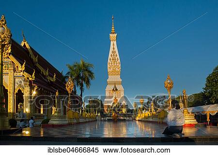 Stock Photography - Chedi of Wat Phra That Phanom, blue hour, temple complex in Amphoe That Phanom, Nakhon Phanom Province, Isan, Thailand, Asia. Fotosearch
