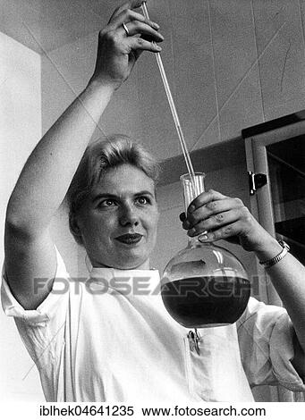 Stock Photography - Chemist does an experiment, 1960s, Berlin, Germany, Europe. Fotosearch