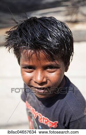 Picture - Child in a slum at the Ghazipur garbage dump, portrait, New Delhi, India, Asia. Fotosearch