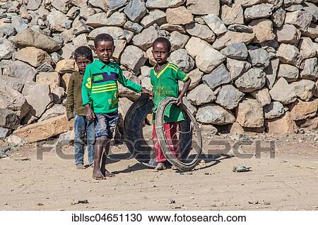 Stock Image - Children playing, at Mekele, Region Tigray, Ethiopia, Africa. Fotosearch