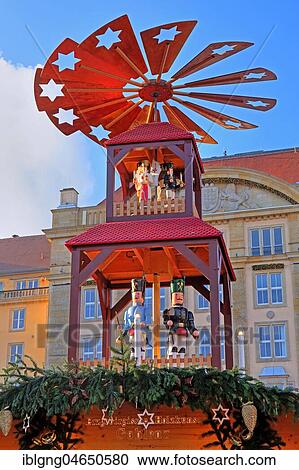 Stock Image - Christmas decoration with Christmas pyramid on Striezelmarkt, Christmas market on Altmarkt, Dresden, Saxony, Germany, Europe. Fotosearch