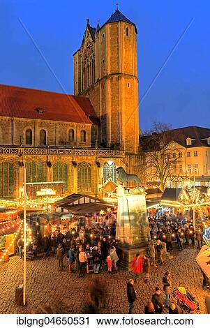 Stock Image - Christmas market on Burgplatz with cathedral and Brunswick Lion, Brunswick, Lower Saxony, Germany, Europe. Fotosearch