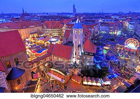 Stock Image - Christmas market on the Burgplatz with castle Dankwarderode, dusk, Brunswick, Lower Saxony, Germany, Europe. Fotosearch