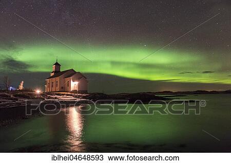 Stock Image - Church at the coast with northern lights, Gimsoy, Lofoten, Norway, Europe. Fotosearch