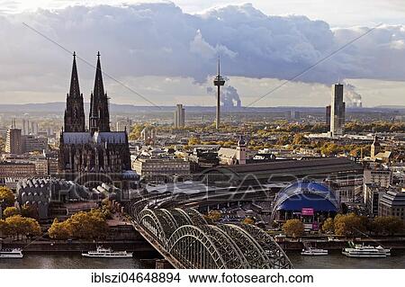 City panorama with Cologne Cathedral, Hohenzollern Bridge and Rhine, Cologne, Rhineland, North Rhine-Westphalia, Germany, Europe View Large Photo Image Picture - City panorama with Cologne Cathedral, Hohenzollern Bridge and Rhine, Cologne, Rhineland, North Rhine-Westphalia, Germany, Europe. Fotosearch