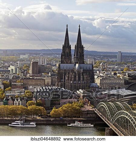 City panorama with Cologne Cathedral, Hohenzollern Bridge and Rhine, Cologne, Rhineland, North Rhine-Westphalia, Germany, Europe View Large Photo Image Stock Image - City panorama with Cologne Cathedral, Hohenzollern Bridge and Rhine, Cologne, Rhineland, North Rhine-Westphalia, Germany, Europe. Fotosearch