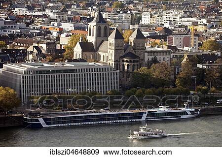 City view with church St. Kunibert and ships on the Rhine, Cologne, Rhineland, North Rhine-Westphalia, Germany, Europe View Large Photo Image Stock Photo - City view with church St. Kunibert and ships on the Rhine, Cologne, Rhineland, North Rhine-Westphalia, Germany, Europe. Fotosearch