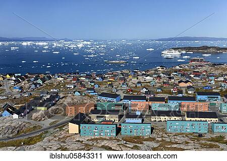 City view with colourful houses, view into Disko Bay to the cruise ship MS Deutschland, Ilulissat, West Greenland, Greenland, North America View Large Photo Image Stock Image - City view with colourful houses, view into Disko Bay to the cruise ship MS Deutschland, Ilulissat, West Greenland, Greenland, North America. Fotosearch