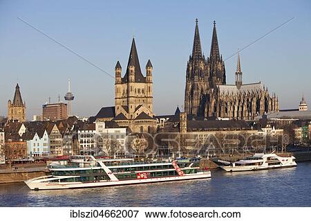 City view with Rhine, town hall tower, church Groß Sankt Martin and Cologne Cathedral, old town, Cologne, North Rhine-Westphalia, Germany, Europe View Large Photo Image Stock Photo - City view with Rhine, town hall tower, church Groß Sankt Martin and Cologne Cathedral, old town, Cologne, North Rhine-Westphalia, Germany, Europe. Fotosearch
