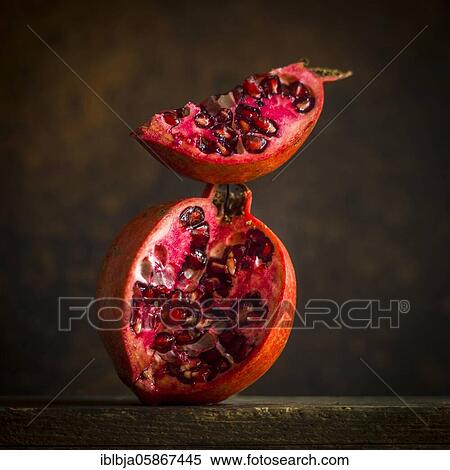 Stock Photography - Close-up halved pomegranate. Fotosearch