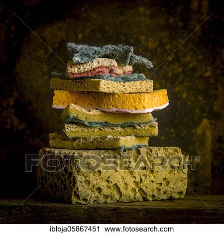Stock Image - Close-up of pile of sponges, studio shot, France, Europe. Fotosearch