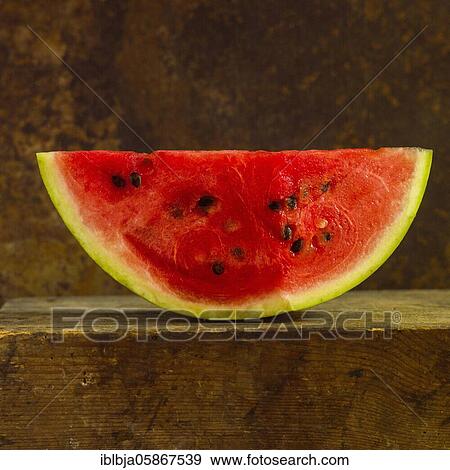 Close-up of watermelon Slice on a brown background, studio shot, France, Europe View Large Photo Image Stock Photo - Close-up of watermelon Slice on a brown background, studio shot, France, Europe. Fotosearch