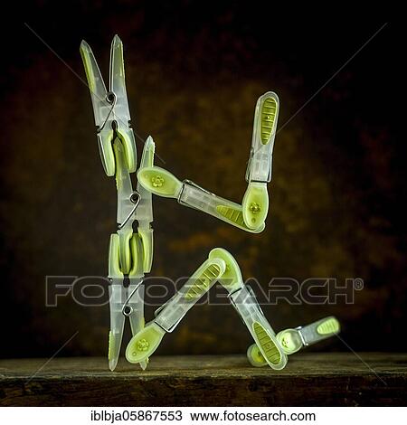 Stock Image - Clothes pegs, studio shot, France, Europe. Fotosearch
