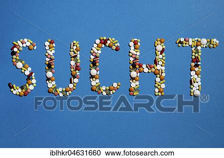 Stock Image - Colourful pills forming the word addiction, symbol picture for addiction and drug abuse, studio shot. Fotosearch