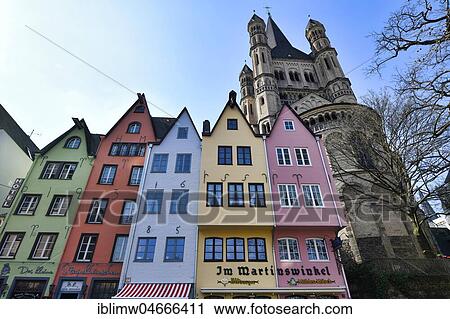 Colourful row of houses with restaurant Im Martinswinkel, church Groß St. Martin, Martinsviertel, Cologne, North Rhine-Westphalia, Germany, Europe View Large Photo Image Stock Image - Colourful row of houses with restaurant Im Martinswinkel, church Groß St. Martin, Martinsviertel, Cologne, North Rhine-Westphalia, Germany, Europe. Fotosearch