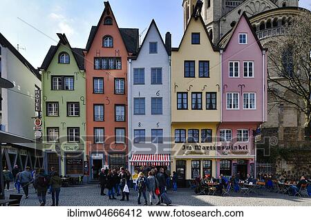 Stock Image - Colourful row of houses with restaurant Im Martinswinkel, Martinsviertel, Cologne, North Rhine-Westphalia, Germany, Europe. Fotosearch