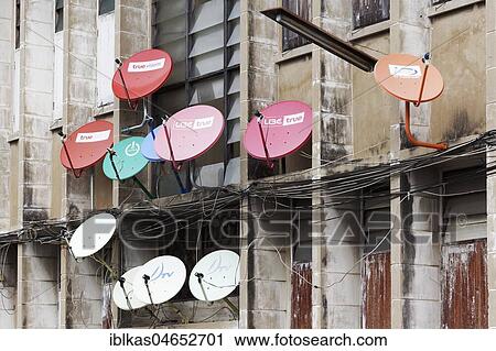 Colourful satellite dishes on a building, Bang Rak, Bangkok, Thailand, Asia View Large Photo Image Stock Image - Colourful satellite dishes on a building, Bang Rak, Bangkok, Thailand, Asia. Fotosearch