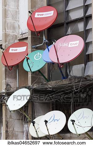Colourful satellite dishes on a building, Bang Rak, Bangkok, Thailand, Asia View Large Photo Image Stock Photo - Colourful satellite dishes on a building, Bang Rak, Bangkok, Thailand, Asia. Fotosearch