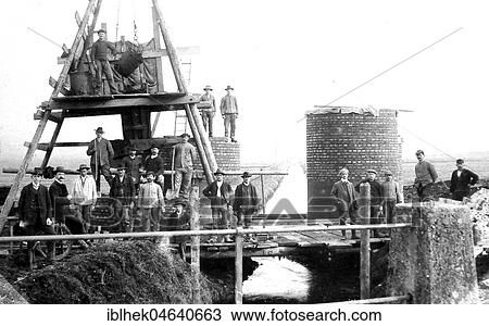 Construction site, masons building a factory, 1920s, exact place unknown, Germany, Europe View Large Photo Image Stock Image - Construction site, masons building a factory, 1920s, exact place unknown, Germany, Europe. Fotosearch