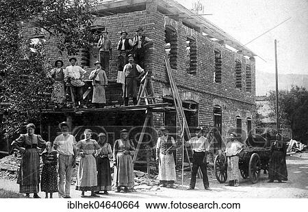 Picture - Construction site, Topping-out ceremony, 1920s, exact location unknown, Germany, Europe. Fotosearch