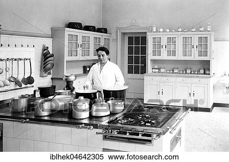 Cook in a large kitchen, ca. 1930s, Germany, Europe View Large Photo Image Stock Photography - Cook in a large kitchen, ca. 1930s, Germany, Europe. Fotosearch