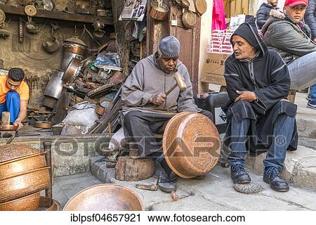 Coppersmiths at work, Place Seffarine, Fez, Morocco, Africa View Large Photo Image Stock Image - Coppersmiths at work, Place Seffarine, Fez, Morocco, Africa. Fotosearch