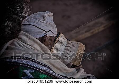 Coptic monk reads in book, Lalibela, Ethiopia, Africa View Large Photo Image Stock Photo - Coptic monk reads in book, Lalibela, Ethiopia, Africa. Fotosearch