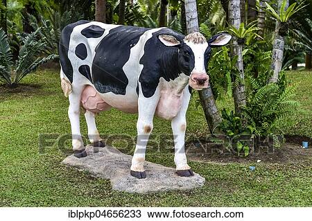 Stock Image - Cow figure, Nong Nooch Tropical Botanical Garden, Pattaya, Thailand, Asia. Fotosearch