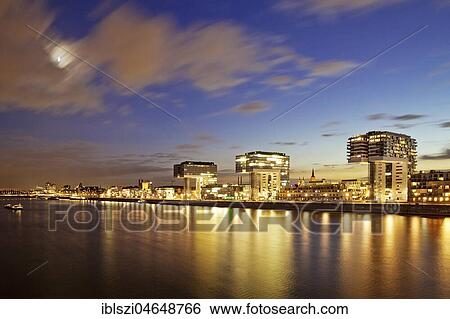 Crane houses with Rhine and Moon in the evening, Cologne, Rhineland, North Rhine-Westphalia, Germany, Europe View Large Photo Image Stock Photograph - Crane houses with Rhine and Moon in the evening, Cologne, Rhineland, North Rhine-Westphalia, Germany, Europe. Fotosearch